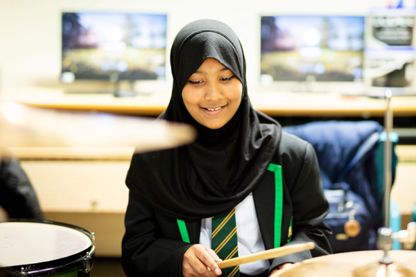 Student playing the drums